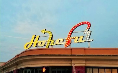HOPEFUL SCULPTURES, PAINTINGS, AND BILLBOARDS SEND OPTIMISTIC MESSAGE ACROSS AMERICA